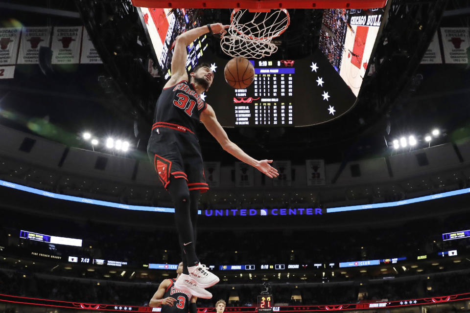 Chicago Bulls guard Tomas Satoransky dunks during the first half of the team's NBA basketball game against the Indiana Pacers in Chicago, Friday, March 6, 2020. (AP Photo/Nam Y. Huh)