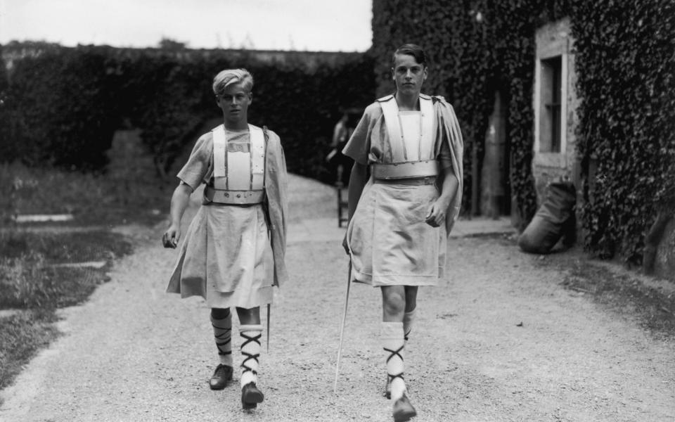 Prince Philip (left) in costume for a production of 'Macbeth' at his school, Gordonstoun in Scotland - Hulton Royals Collection