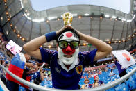 <p>Japan fan with a replica World Cup trophy inside the stadium before the match REUTERS/Jorge Silva </p>