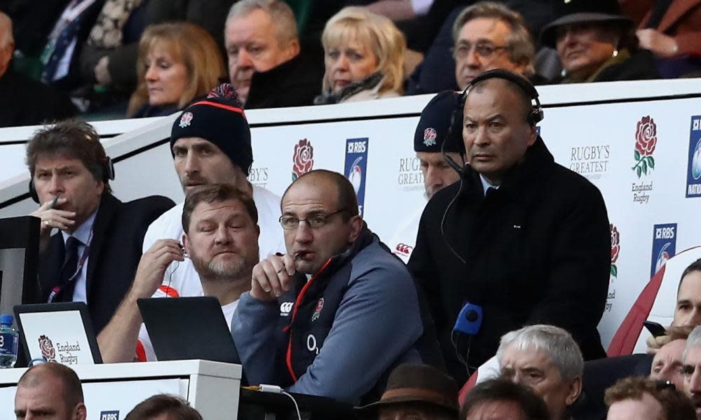 Eddie Jones, the England head coach, looks on with his coaching team