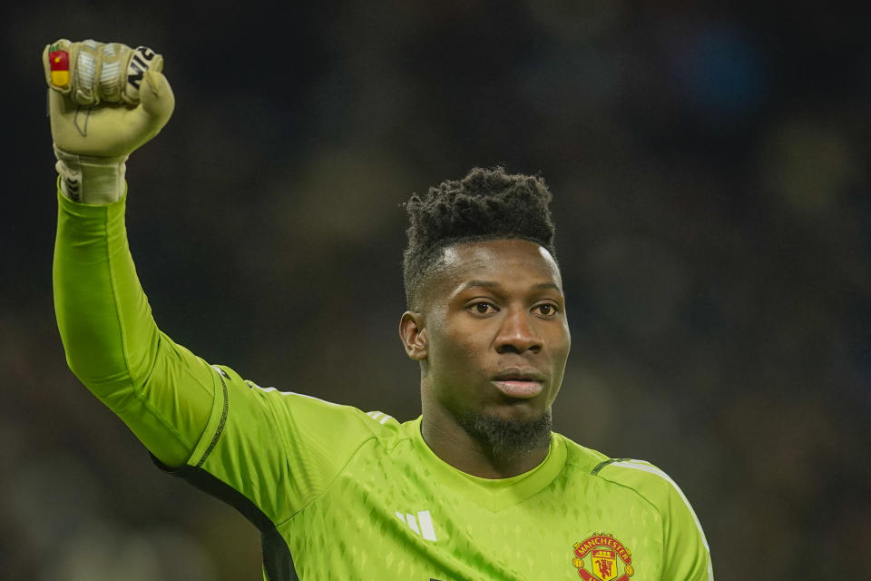 Manchester United's goalkeeper Andre Onana reacts during the English Premier League soccer match between Manchester United and Chelsea at Old Trafford stadium in Manchester, England, Wednesday, Dec. 6, 2023. (AP Photo/Dave Thompson)