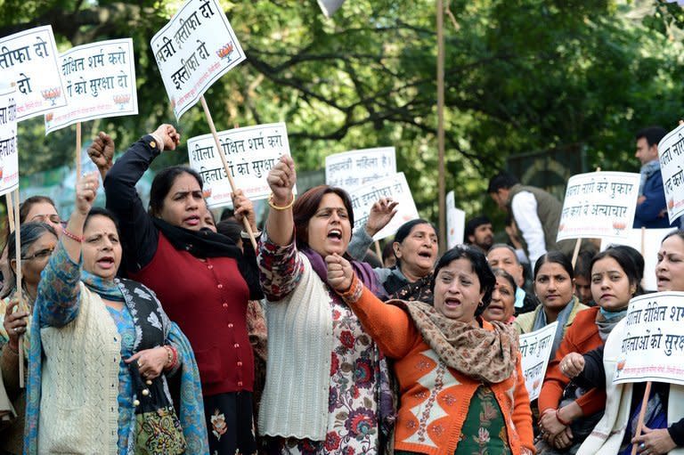 Activists from India's main opposition Bharatiya Janata Party (BJP) shout anti-government slogans as they demand the resignation of the Delhi chief minister during a protest in the capital on December 19, 2012. They were demonstrating over the gang-rape of a 23-year-old student on a bus