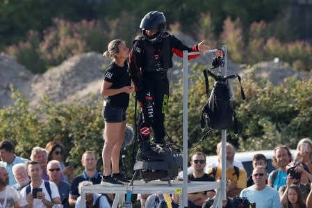 French inventor Franky Zapata gets ready for take off on a Flyboard to cross the English channel from Sangatte in France to Dover, in Sangatte