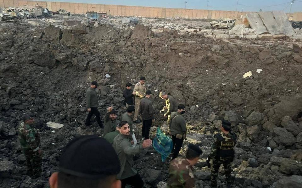 The aftermath of the blast on the Kalso military base in Babylon province, south of Baghdad