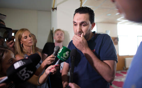 Ali Yassine talks to the media inside Ripoll Mosque - Credit:  JEFF GILBERT