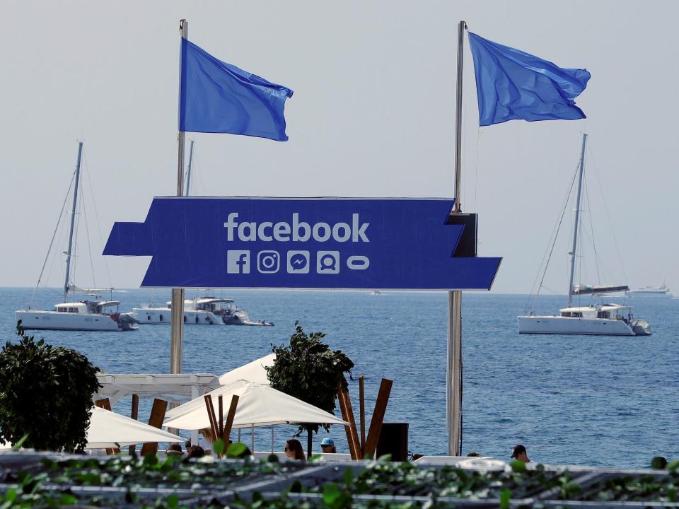 The logo of the social network Facebook is seen on a beach during the Cannes Lions in Cannes, France, June 21, 2017: REUTERS/Eric Gaillard