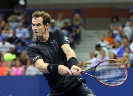 Sep 1, 2015; New York, NY, USA; Andy Murray of Great Britain returns a shot to Nick Kyrgios of Australia on day two of the 2015 U.S. Open tennis tournament at USTA Billie Jean King National Tennis Center. Mandatory Credit: Jerry Lai-USA TODAY Sports