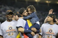 <p>Marwin Gonzalez #9 of the Houston Astros celebrates on the field with his daughter after the Astros defeated the Los Angeles Dodgers in Game 7 of the 2017 World Series at Dodger Stadium on Wednesday, November 1, 2017 in Los Angeles, California. (Photo by Rob Tringali/MLB Photos via Getty Images) </p>