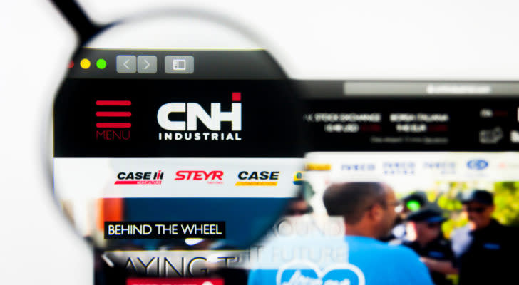 A magnifying glass is focused on the logo for CNH Industrial on the company's website.