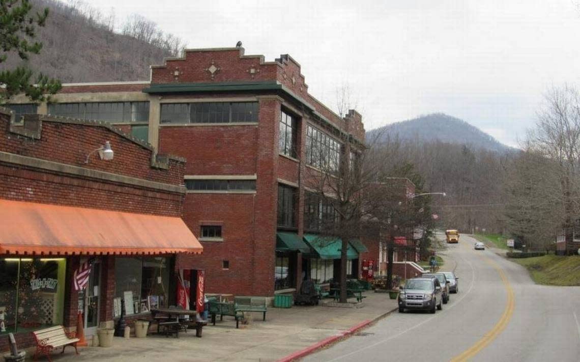 The taller building at left, built in 1923, was the coal-company commissary in Benham, where miners could buy a wide range of goods. The building, which now houses the Kentucky Coal Mining Museum, is among the historic structures in downtown Benham. Company stores allowed the coal company to control all the money and goods in a town, a model somewhat similar to dollar stores today.