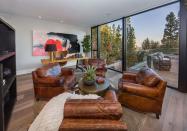 <p>The armchairs are arrayed this way to foster collaboration with fellow writers. (Photo: <a href="http://bit.ly/1UCMKf2" rel="nofollow noopener" target="_blank" data-ylk="slk:Sotheby’s International Realty via Catherine Marcus;elm:context_link;itc:0;sec:content-canvas" class="link ">Sotheby’s International Realty via Catherine Marcus</a>, shot by Mark Lee)</p>