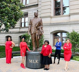 Vivian Childs (center) and other Black Republican women  stood outside the state capitol in Georgia in 2020. Childs is running for Congress, where there are no Black GOP women.