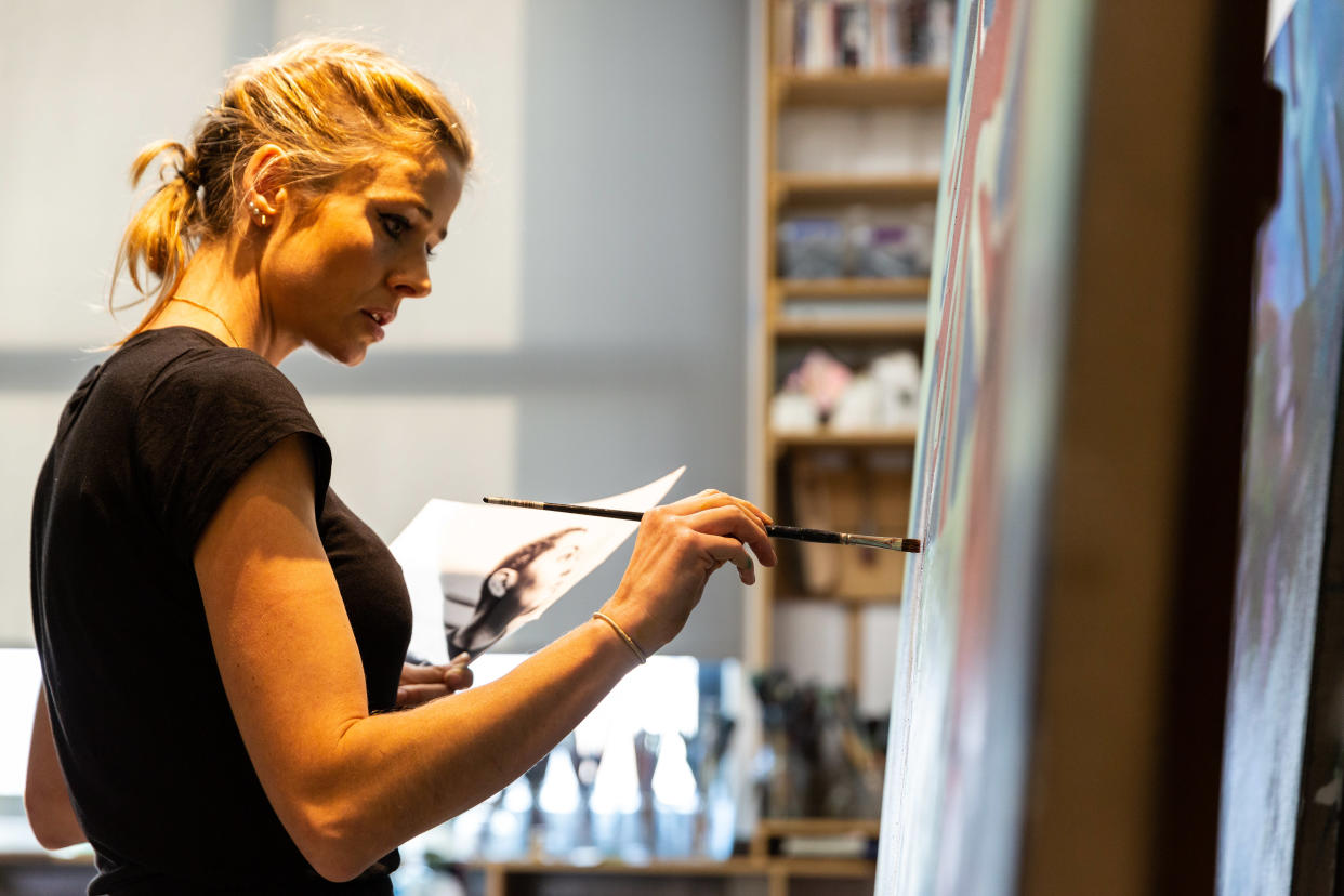 Raw, 36, swapped running, swimming and cycling for a career as a full-time artist in 2016          