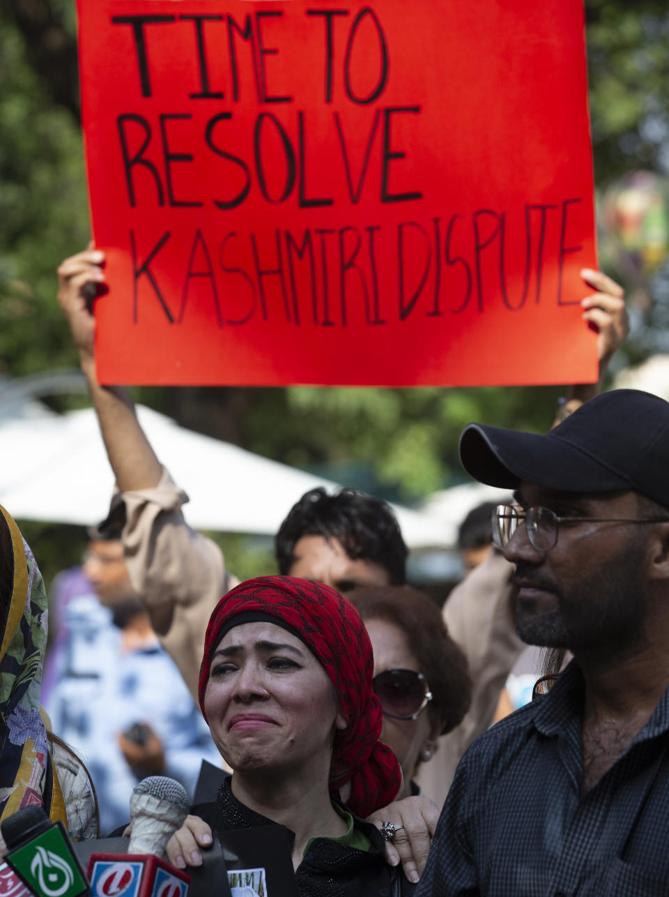 A Pakistani protester in tears expresses solidarity with Indian Kashmiris, in Islamabad, Pakistan, Thursday, Aug. 29, 2019. Kashmir is divided between India and Pakistan since they won independence from British colonialists in 1947. They have fought two wars over its control. (AP Photo/B.K. Bangash)