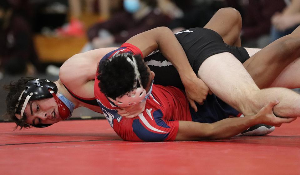 Whitman-Hanson's Aidan Guiliani competes during a wrestling match against Bridgewater-Raynham at Whitman-Hanson Regional High School on Saturday, January 22, 2022.