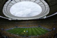 A general view of the stadium is seen as the national anthems are sung before the start of the 2014 World Cup third-place playoff between Brazil and the Netherlands at the Brasilia national stadium in Brasilia July 12, 2014. REUTERS/Ruben Sprich (BRAZIL - Tags: SOCCER SPORT WORLD CUP)