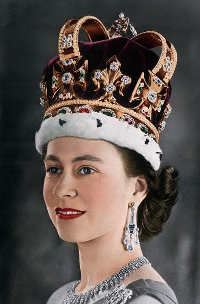 A portrait of Queen Elizabeth II wearing a crown for her coronation.