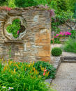 <p> Architectural salvage opens up a wealth of possibilities, and reclaimed sections of stone walls or follies can be reused as screens to create divisions between garden rooms. </p> <p> This folly stone wall includes a quatrefoil window through which you can glimpse a further seating area of the garden. </p>