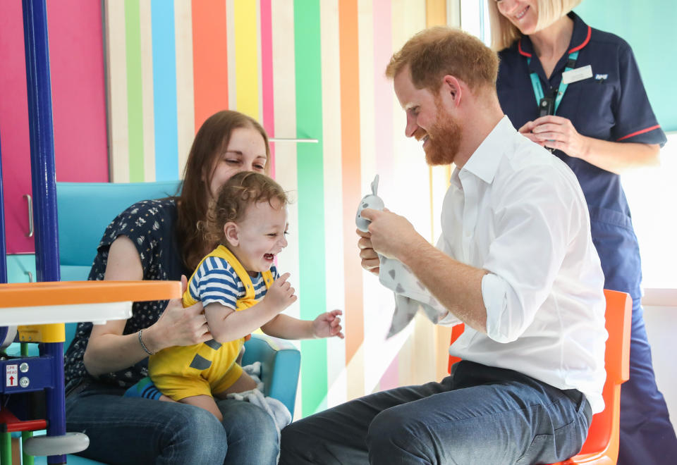 The Duke of Sussex plays with one year old Noah Nicholson during his visit to Sheffield Children's Hospital in Clarkson Street, Sheffield, where he officially opened the new wing.