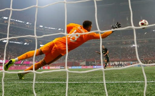 Goalkeeper Zack Steffen of the MLS All-Stars fails to block a penalty shot by Mattia De Sciglio of Juventus during their 2018 MLS All-Star Game, at Mercedes-Benz Stadium in Atlanta, Georgia, on August 1