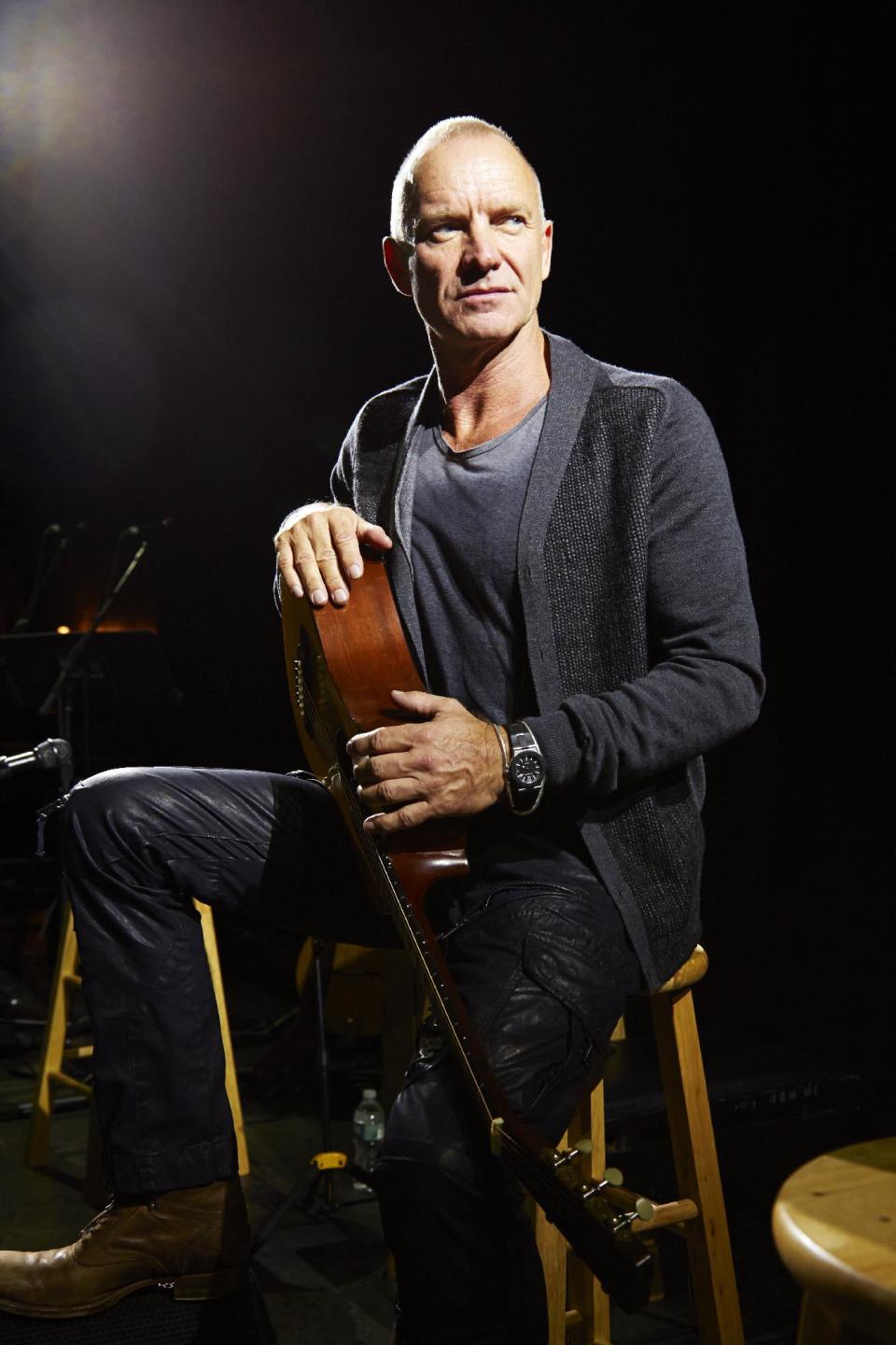 In this Sept. 26, 2013, photo, Sting poses for a portrait at The Public Theater in promotion of his new album, "The Last Ship," in New York. (Photo by Dan Hallman/Invision/AP)