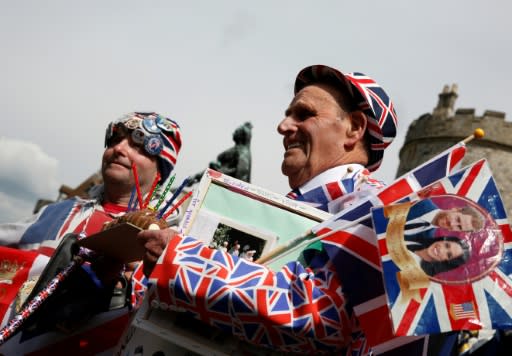 Royal super fans John Loughery (l) and Terry Hutt, celebrating the royal birth outside Windsor Castle