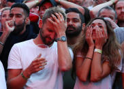 <p>England fan looks dejected after the match. REUTERS/Simon Dawson </p>
