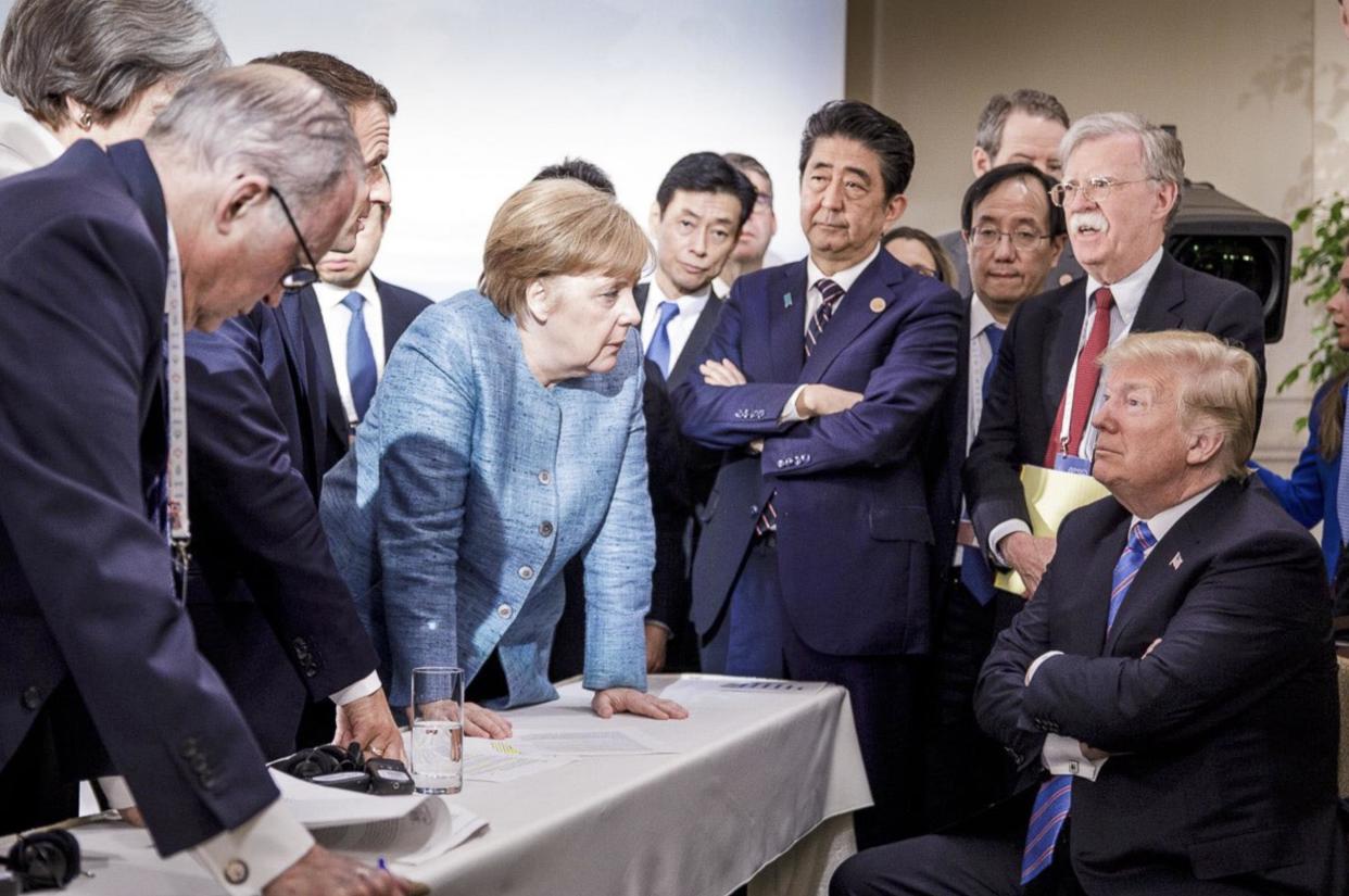 The photo, which has been widely disseminated on social media, came amid as mounting tensions between Mr Trump, Ms Merkel, and other G-7 leaders over trade disputes: Associated Press