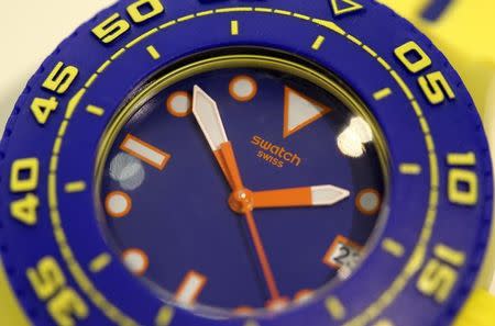 A Swatch Scuba Playero wrist watch is displayed in a shop in Zurich July 23, 2013. REUTERS/Arnd Wiegmann