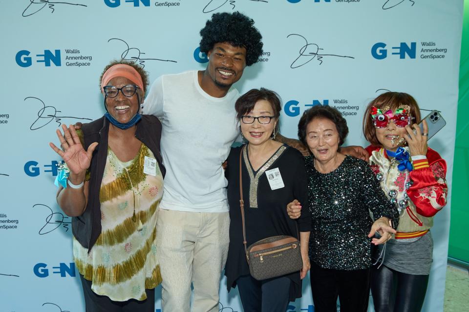Los Angeles Chargers safety Derwin James (second from left) poses with attendees of a dance party he hosted at GenSpace, a community center for the older community of Los Angeles.