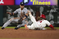 New York Yankees shortstop Isiah Kiner-Falefa, left, prepares to tag St. Louis Cardinals' Brendan Donovan out on a failed stolen base attempt during the eighth inning of a baseball game Saturday, Aug. 6, 2022, in St. Louis. (AP Photo/Jeff Roberson)