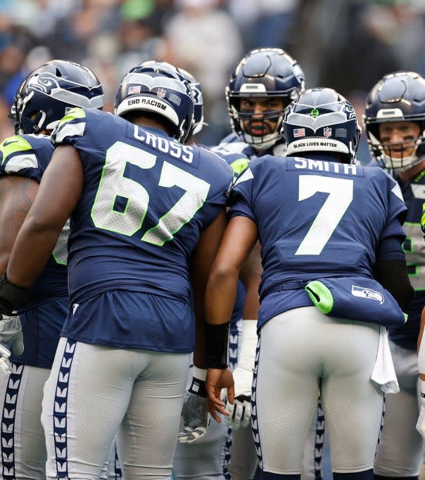 seattle seahawks team huddle