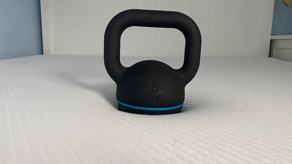 An 8kg kettlebell on the Hypnia Supreme Memory Mattress