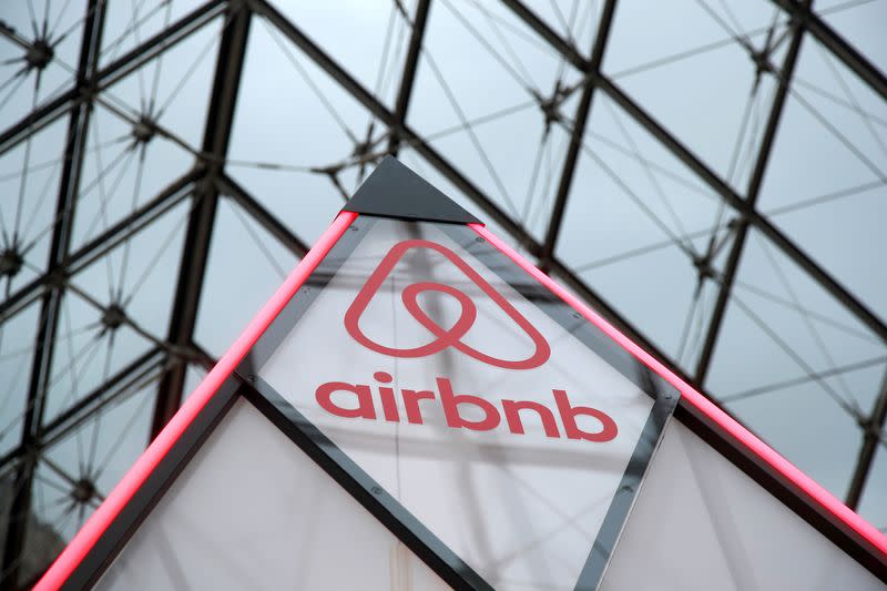 FILE PHOTO: Airbnb logo is seen on a little mini pyramid under the glass Pyramid of the Louvre museum in Paris