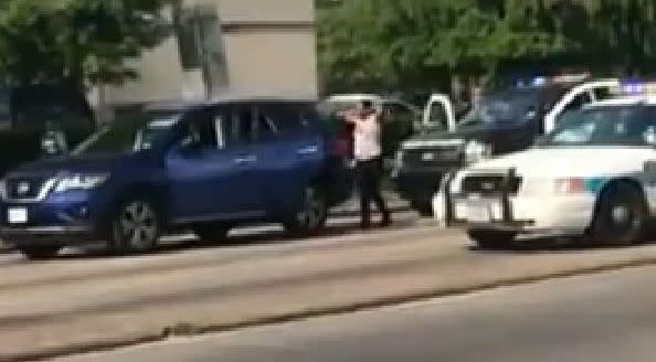 An officer in Houston was filmed on May 19 ordering a woman to put her hands up, saying, "Pretend like we&rsquo;re going to shoot you." (Photo: Facebook)