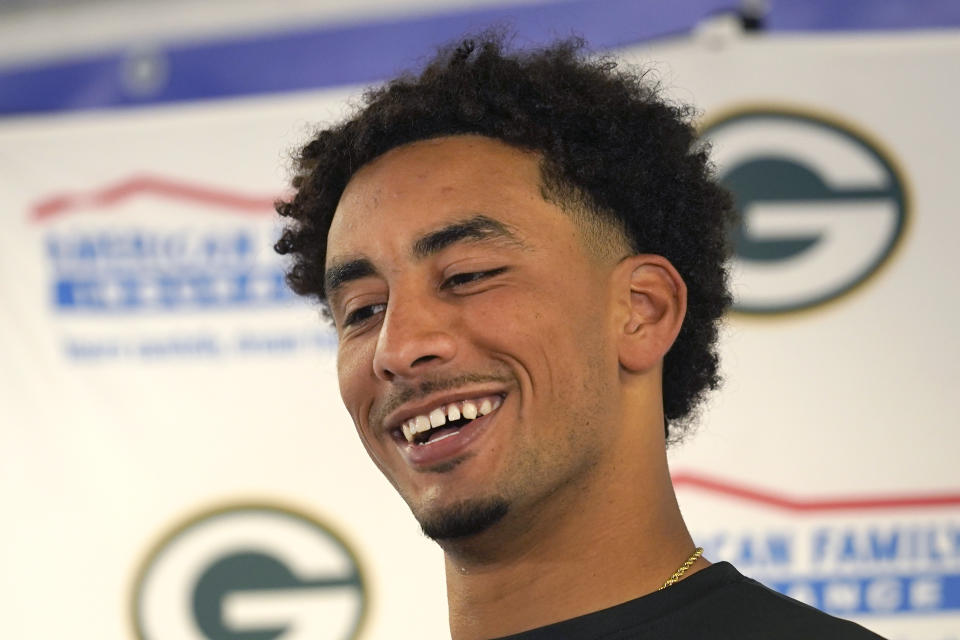 Green Bay Packers quarterback Jordan Love smiles as he listens to a question during a news conference after an NFL football game against the Chicago Bears Sunday, Sept. 10, 2023, in Chicago. The Packers won 38-20. (AP Photo/Nam Y. Huh)