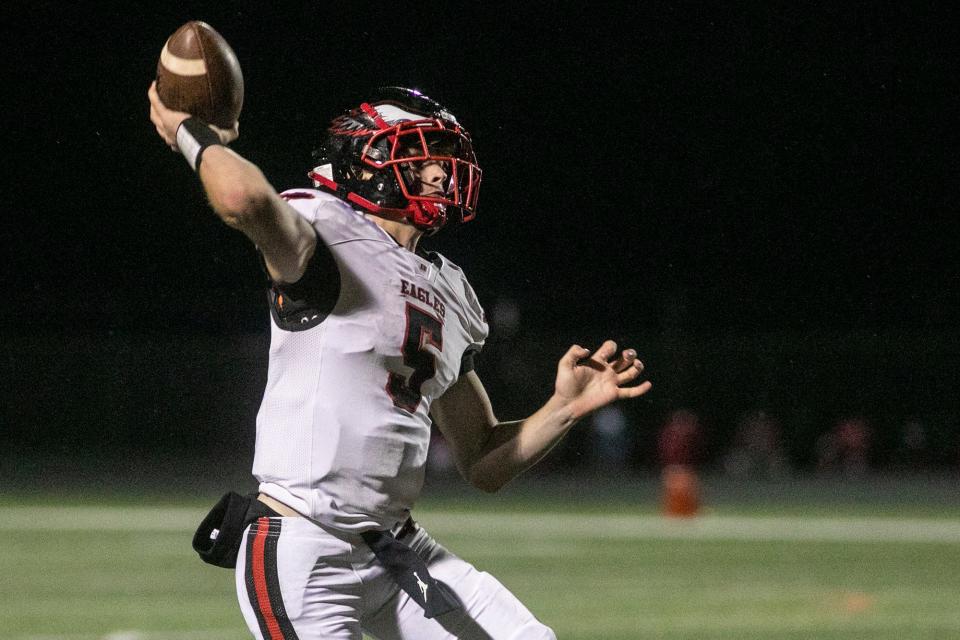 Dover quarterback Aric Campbell throws a pass during a YAIAA Division II football game against York Suburban at York Suburban High School, Friday, September 30, 2022. The Eagles won, 35-21.