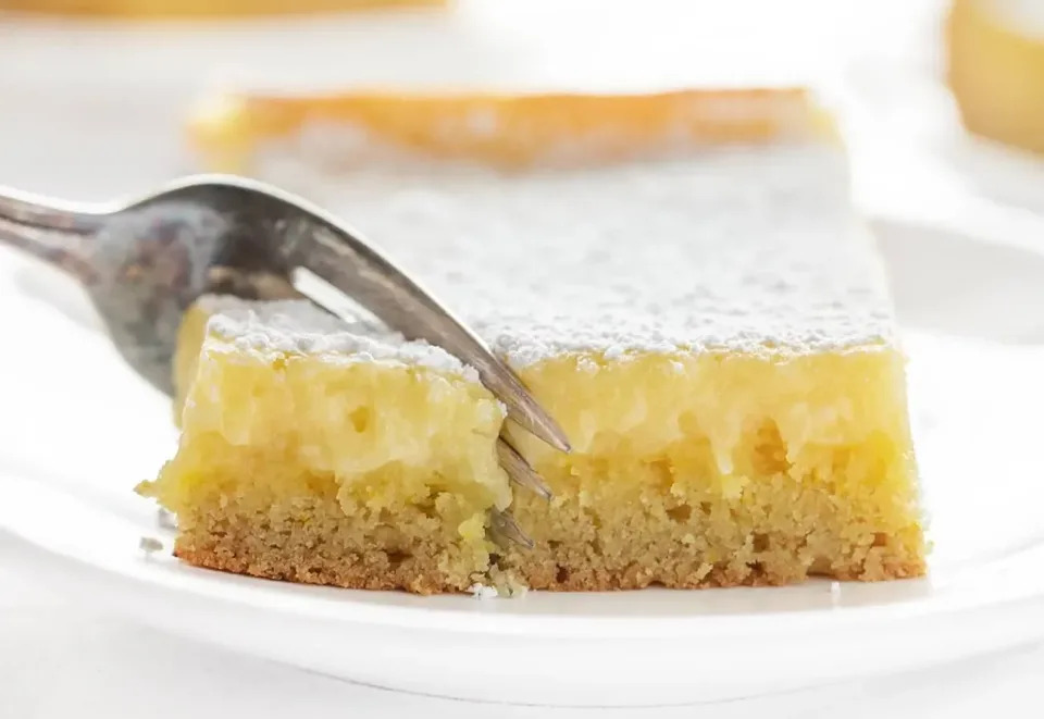 <a href="https://iambaker.net/lemon-ooey-gooey-cake/" target="_blank" rel="noopener noreferrer"><strong>Get the Lemon Ooey Gooey Cake recipe from I Am Baker</strong></a>