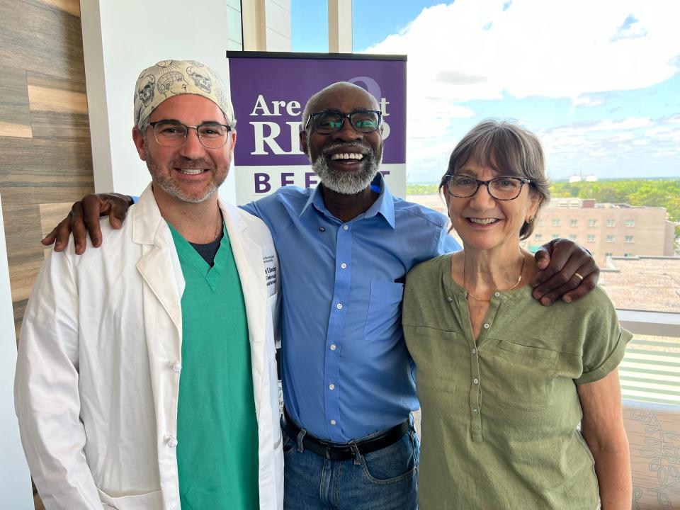 Dr. Jeffrey Beecher, Chuck Carree and Paige Owens are reunited at Novant Health New Hanover Regional Medical Center for the first time since Beecher performed surgery to remove a clot from Carree's brain in December 2023.