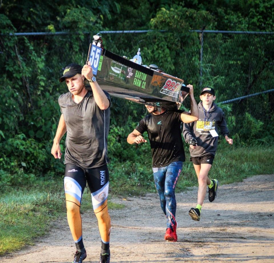 Action from the 2021 AuSable River Canoe Marathon.