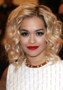 Celebrities wearing red lipstick: Rita Ora styled her pout with peroxide blonde curls. <br><br>[Rex]