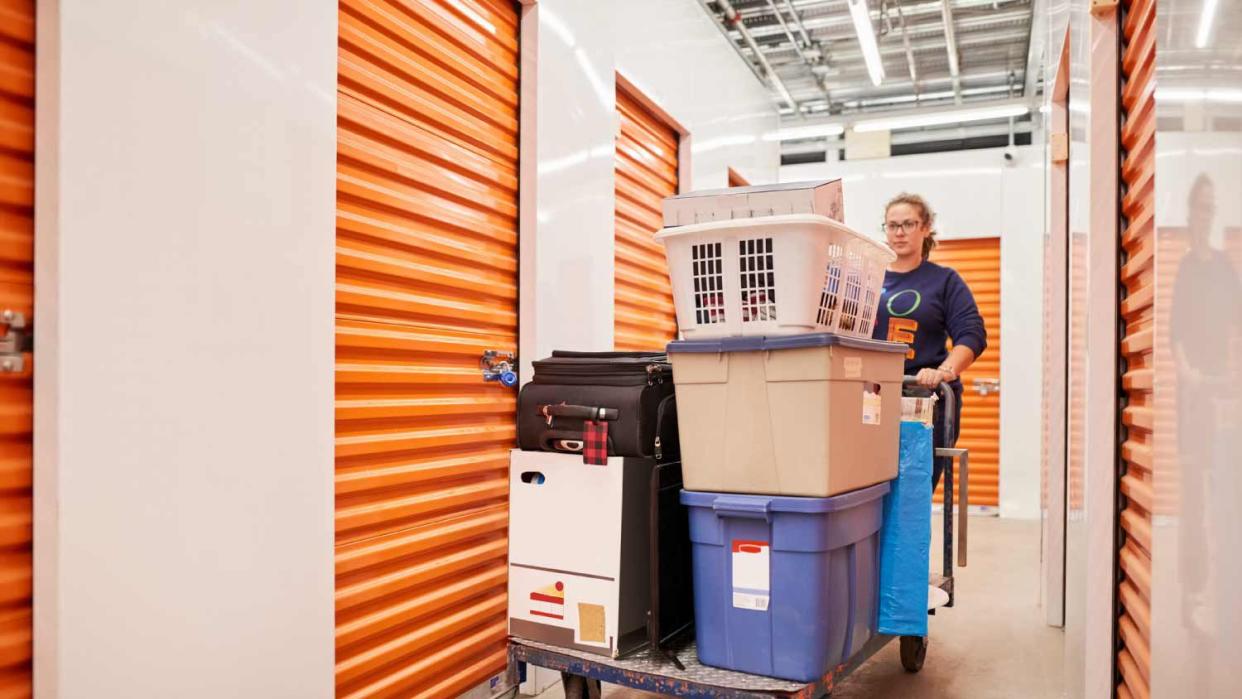 Woman pushing belongings