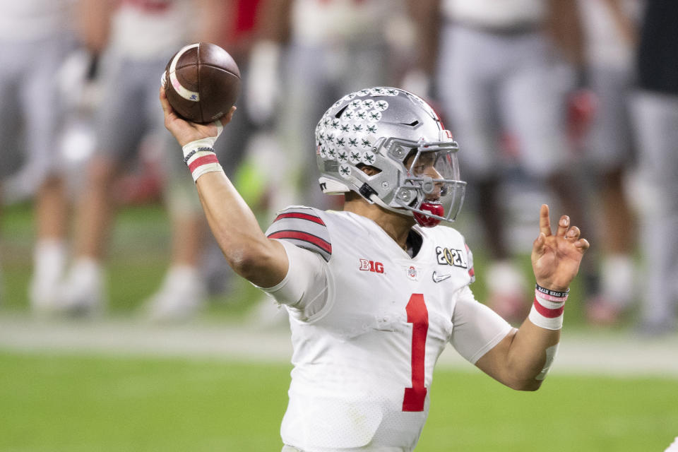 MIAMI GARDENS, FL - JANUARY 11: Ohio State Buckeyes quarterback Justin Fields (1) throws the ball during the College Football Playoff National Championship football game between the Alabama Crimson Tide and the Ohio State Buckeyes on January 11, 2021 at the Hard Rock Stadium in Miami Gardens, FL. (Photo by Doug Murray/Icon Sportswire via Getty Images)