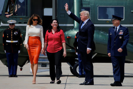 U.S. President Donald Trump (2nd R) and his wife Melania arrive to board Air Force One for his first international trip as president, including stops in Saudi Arabia, Israel, the Vatican, Brussels and at the G7 summit in Sicily, from Joint Base Andrews, Maryland, U.S., May 19, 2017. REUTERS/Jonathan Ernst