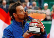 Tennis - ATP 1000 - Monte Carlo Masters - Monte-Carlo Country Club, Roquebrune-Cap-Martin, France - April 21, 2019 Italy's Fabio Fognini celebrates with the trophy after winning the final against Serbia's Dusan Lajovic REUTERS/Eric Gaillard