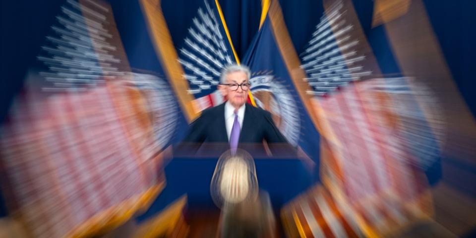 In this photo taken while zooming with a slow shutter speed Federal Reserve Board Chair Jerome Powell speaks during a news conference about the Federal Reserve's monetary policy at the Federal Reserve, Wednesday, Dec. 13, 2023, in Washington.