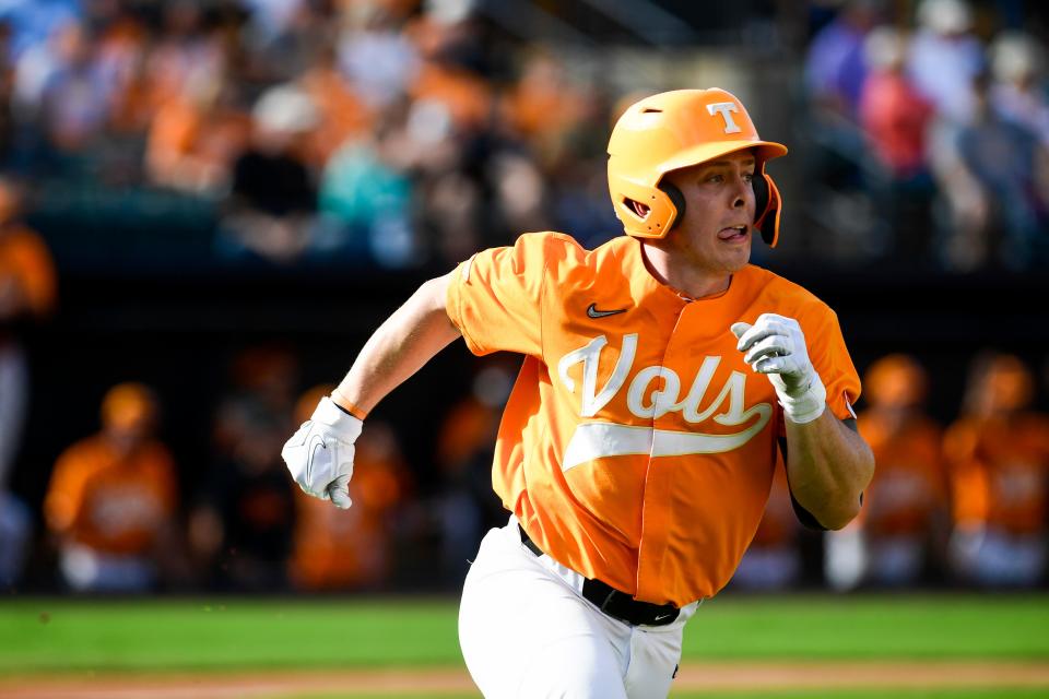 Tennessee’s Charlie Taylor (14) runs to first base during the game between University of Memphis and Tennessee on Sunday, November 6, 2022, at The Ballpark at Jackson in Jackson, Tenn. The teams played an 18-inning game as the last official game of the fall season. Tennessee outscored Memphis 22-4. 