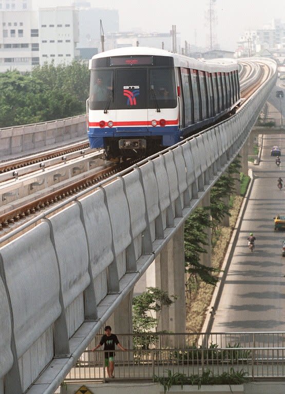 A skytrain, part of Bangkok's first mass transit system, makes its way above city street in 1998. Under a new $68 bn scheme, 200 high-speed trains will whizz across Thailand on four lines linking the capital Bangkok with the north, south and east of the country