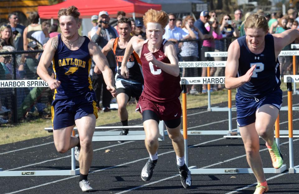 Russell Hush crosses the finish line of the 110-meter hurdles during the Harbor Springs Ram Scram on Friday, April 14.