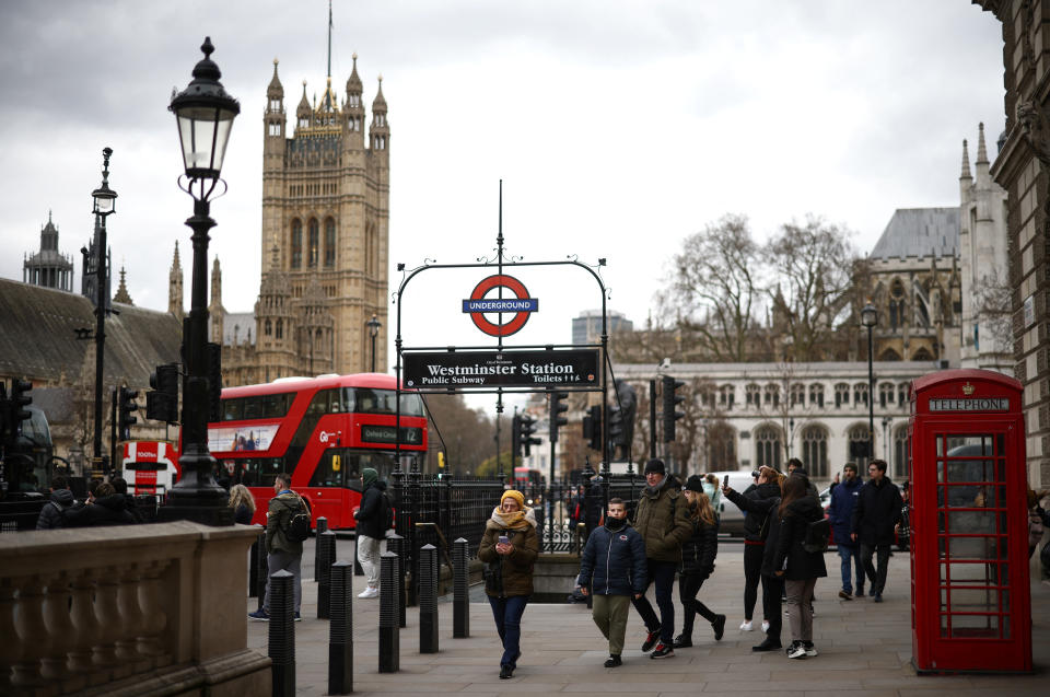 FTSE People walk through Westminster with the Houses of Parliament in the background in London, Britain, March 3, 2023. REUTERS/Henry Nicholls